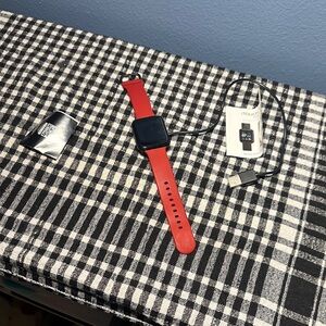 Smartwatch in Red itouch air 3 excellent condition.